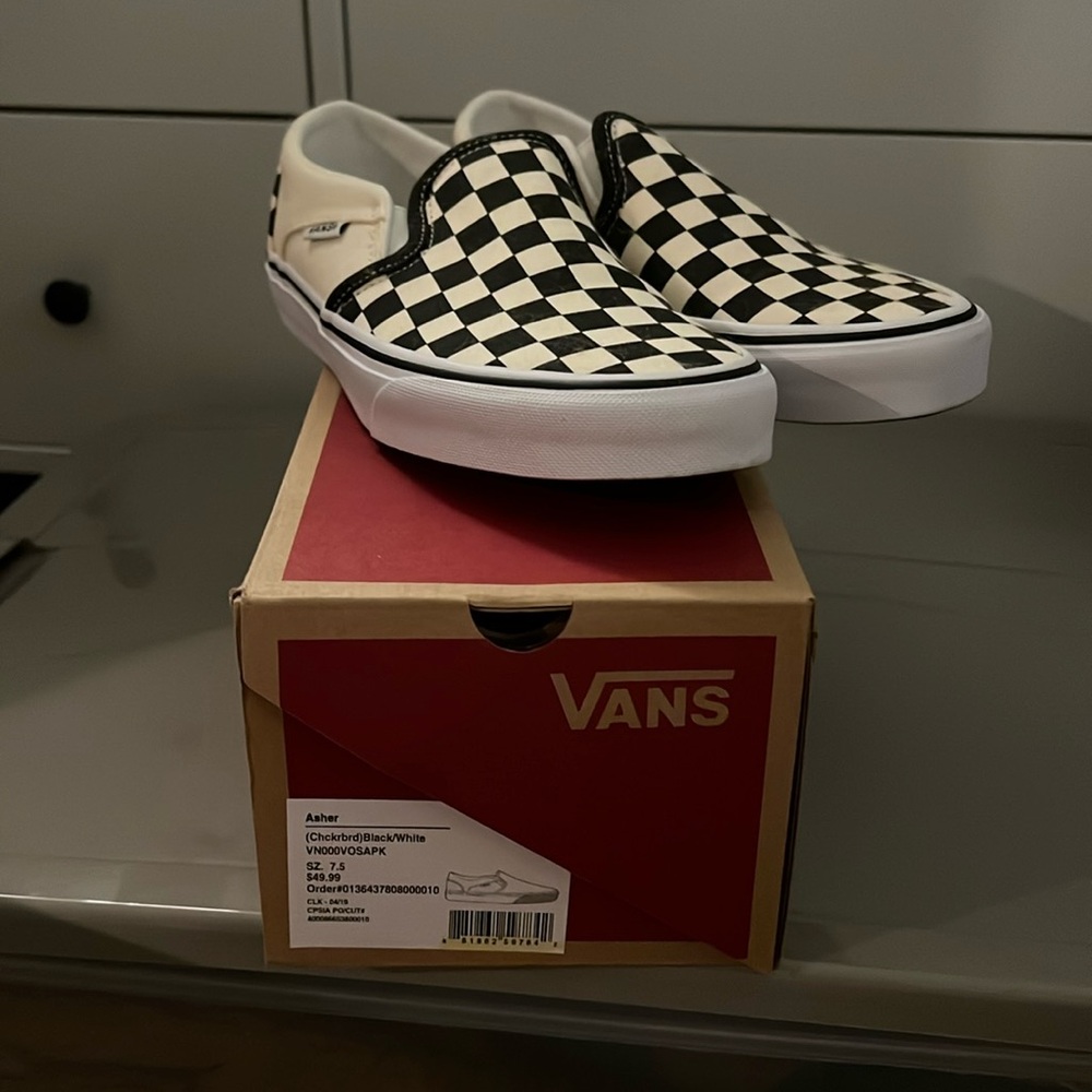 VGUC Vans Slip on Checkered Black/White sneakers